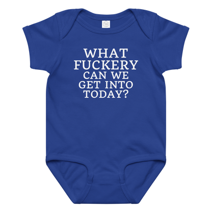 "What fuckery can we get into today?" printed on a royal baby jersey bodysuit laying on a flat surface amongst other clothes