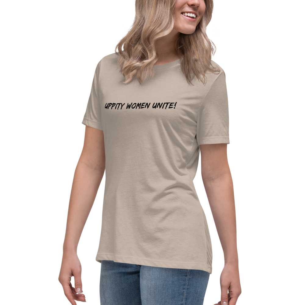 "Uppity Women Unite" printed on a heather stone women's relaxed t-shirt worn by a female