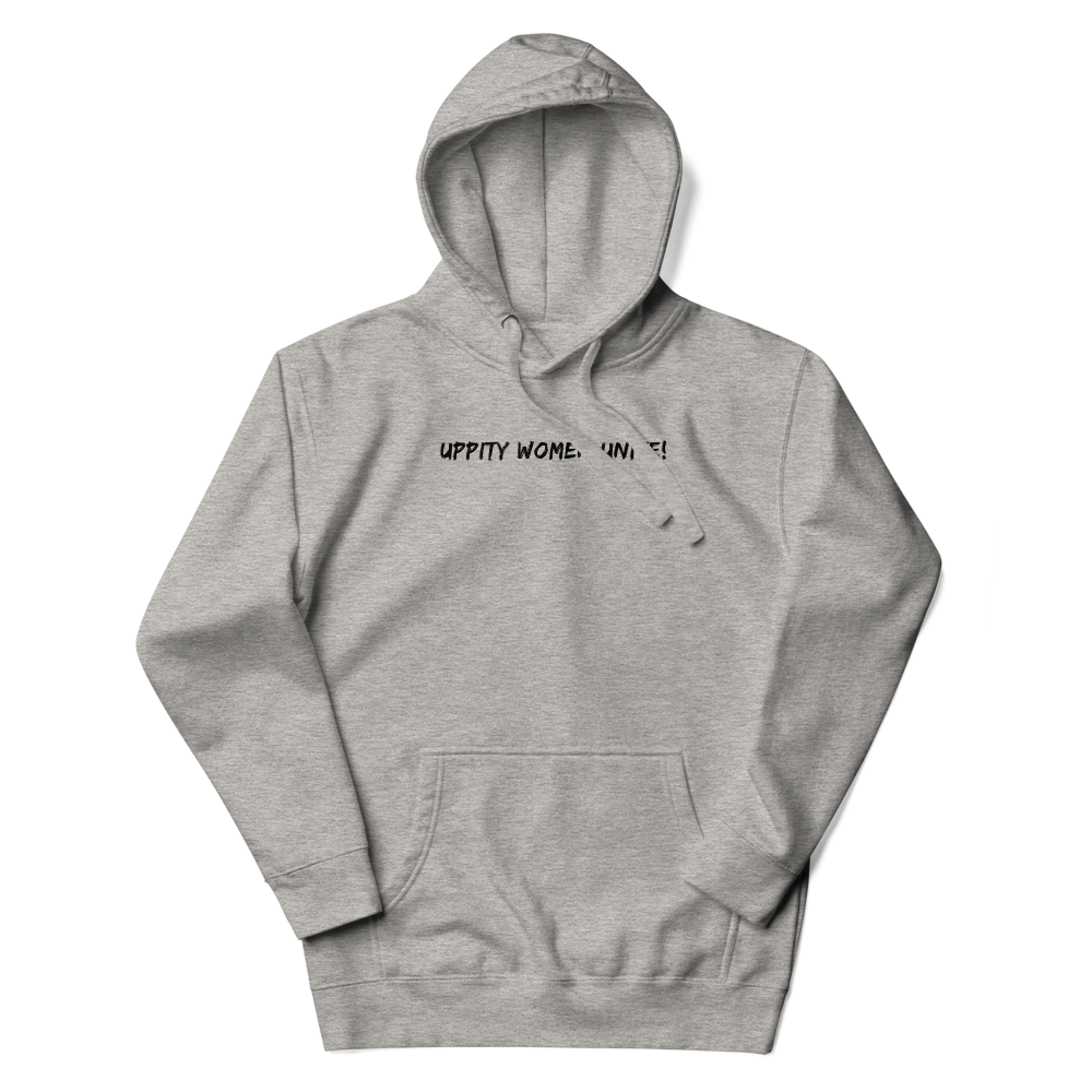 "Uppity Women Unite" printed on a carbon grey unisex hoodie laying on a flat surface with the hood up