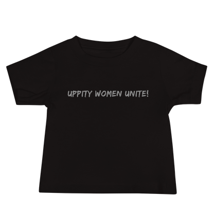 "Uppity Women Unite" printed on a black baby jersey short sleeve tee laying on a flat surface