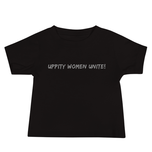 "Uppity Women Unite" printed on a black baby jersey short sleeve tee laying on a flat surface