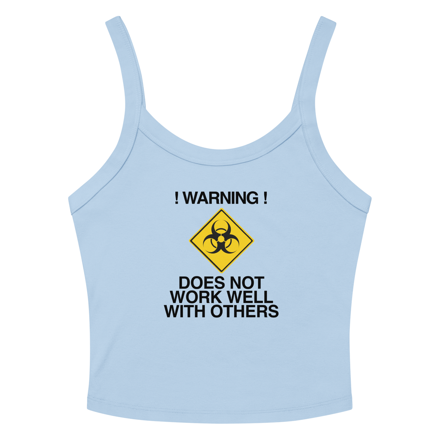 "!Warning! Does Not Work Well With Others" printed on a solid baby blue blend women's micro-rib tanktop laying on a flat surface amongst sunglasses and shorts