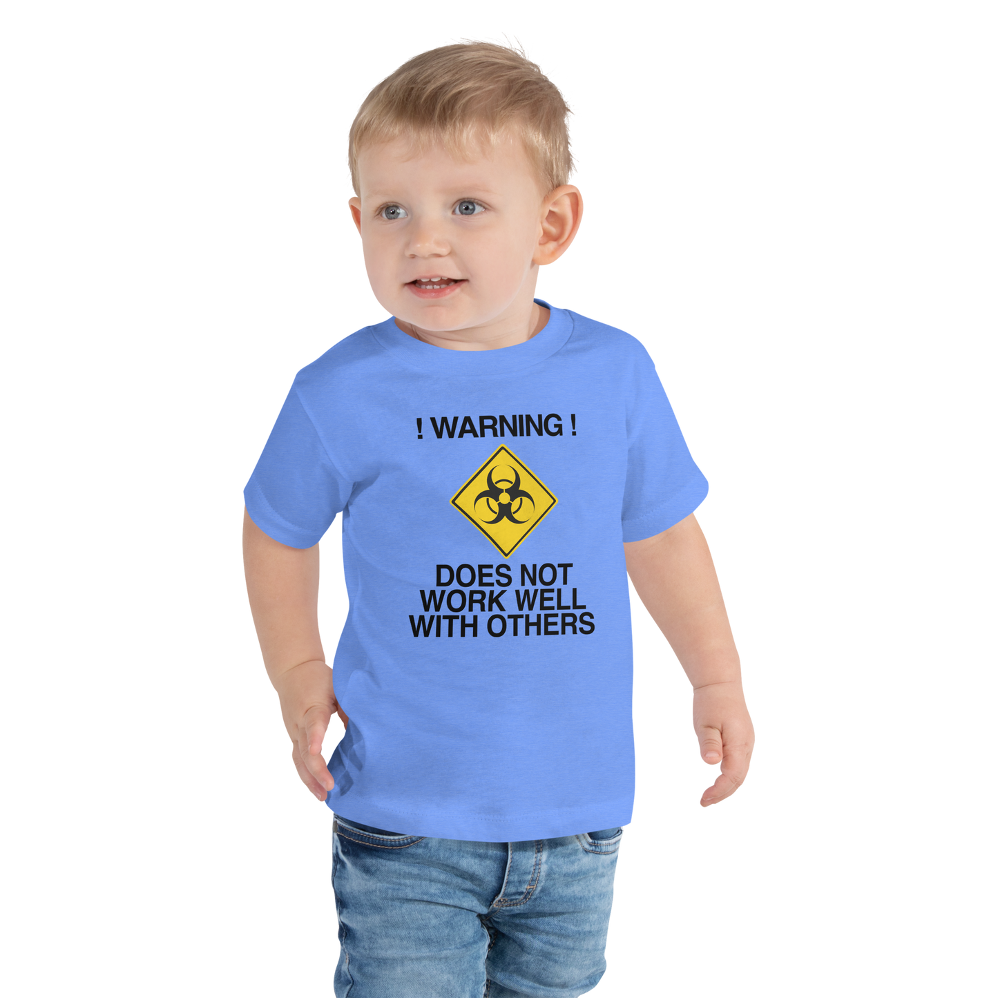 "!Warning! Does Not Work Well With Others" printed on a heather columbia blue toddler short sleeve tee worn by a male