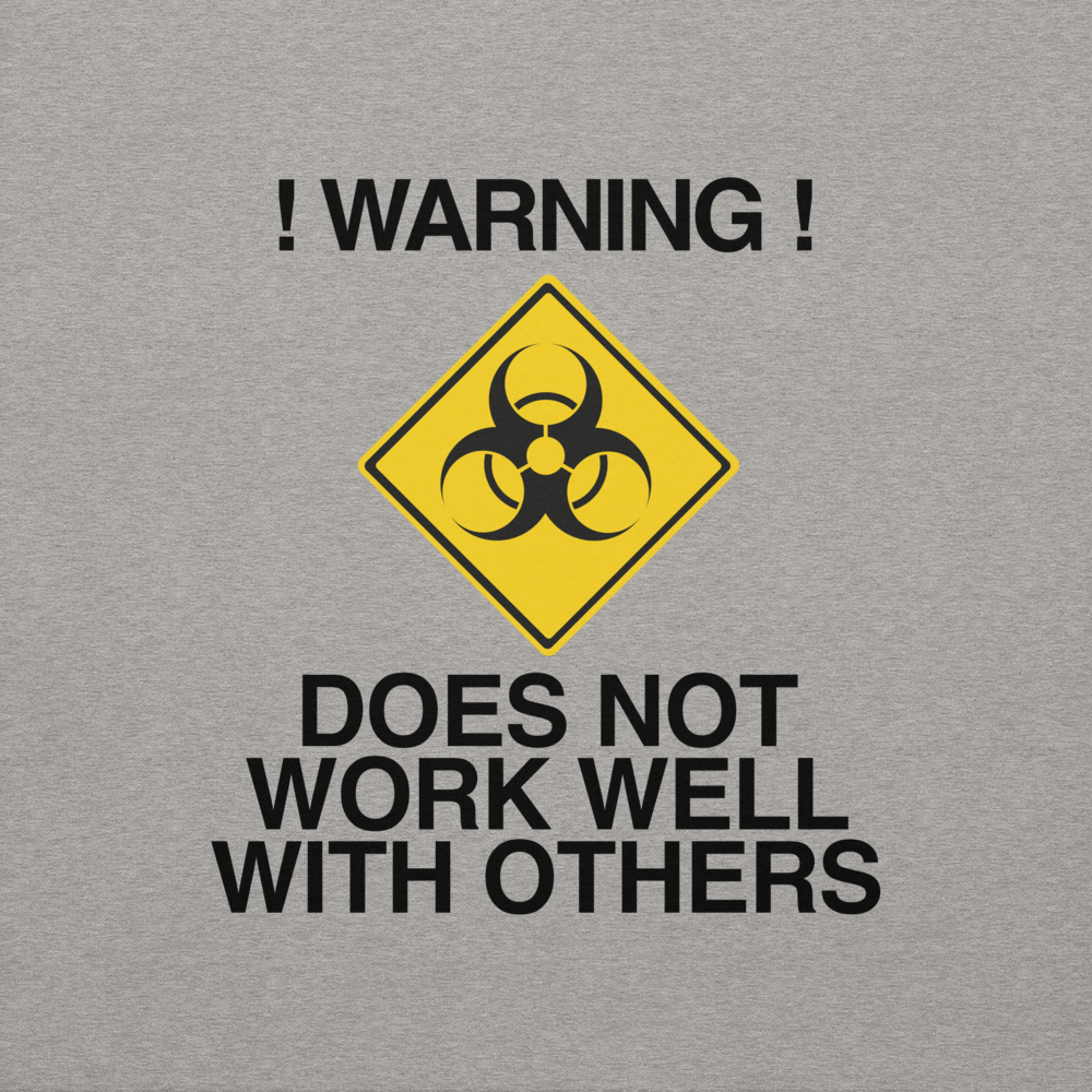 "!Warning! Does Not Work Well With Others" printed on a carbon grey background
