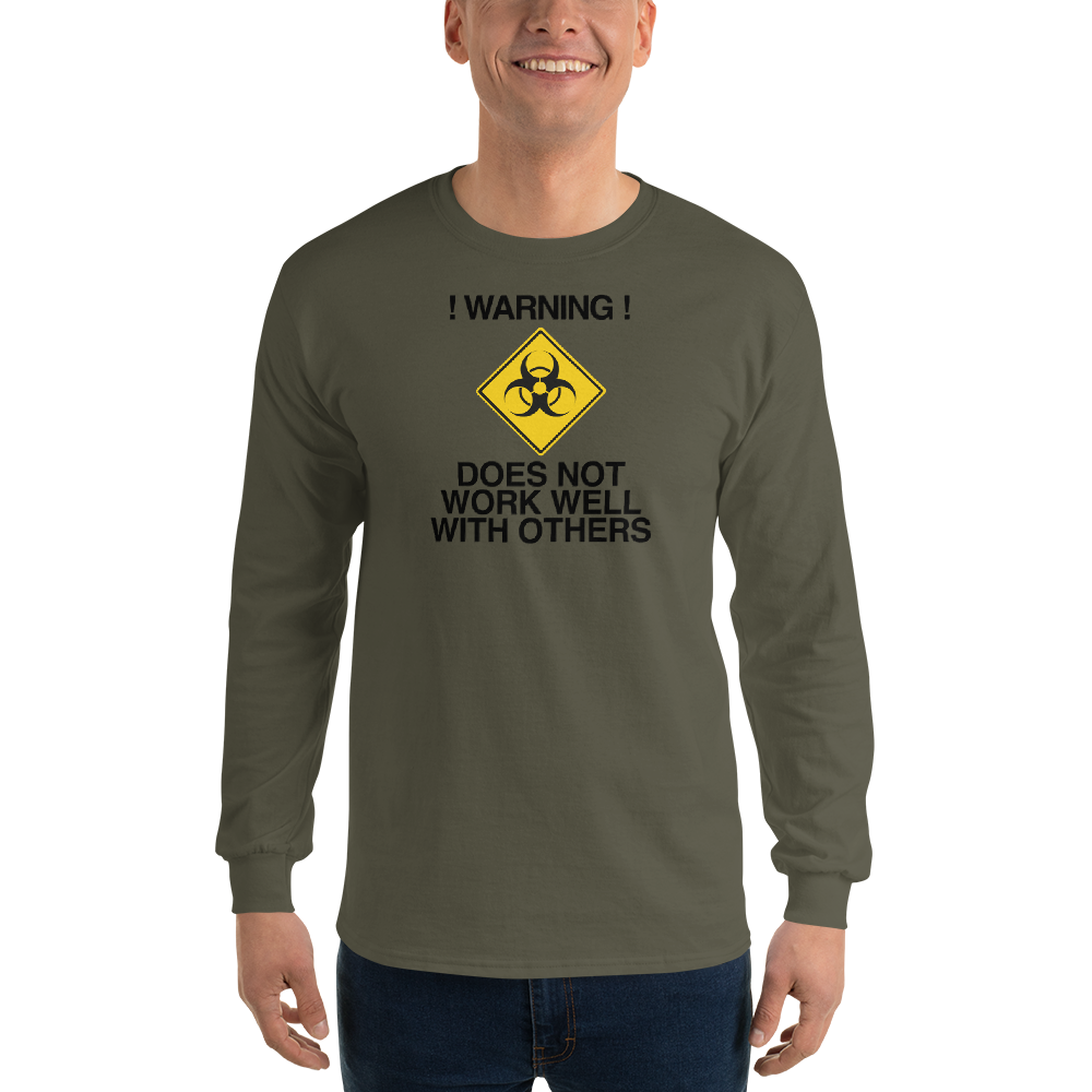 "!Warning! Does Not Work Well With Others" printed on a military green men's long sleeve shirt worn by a male