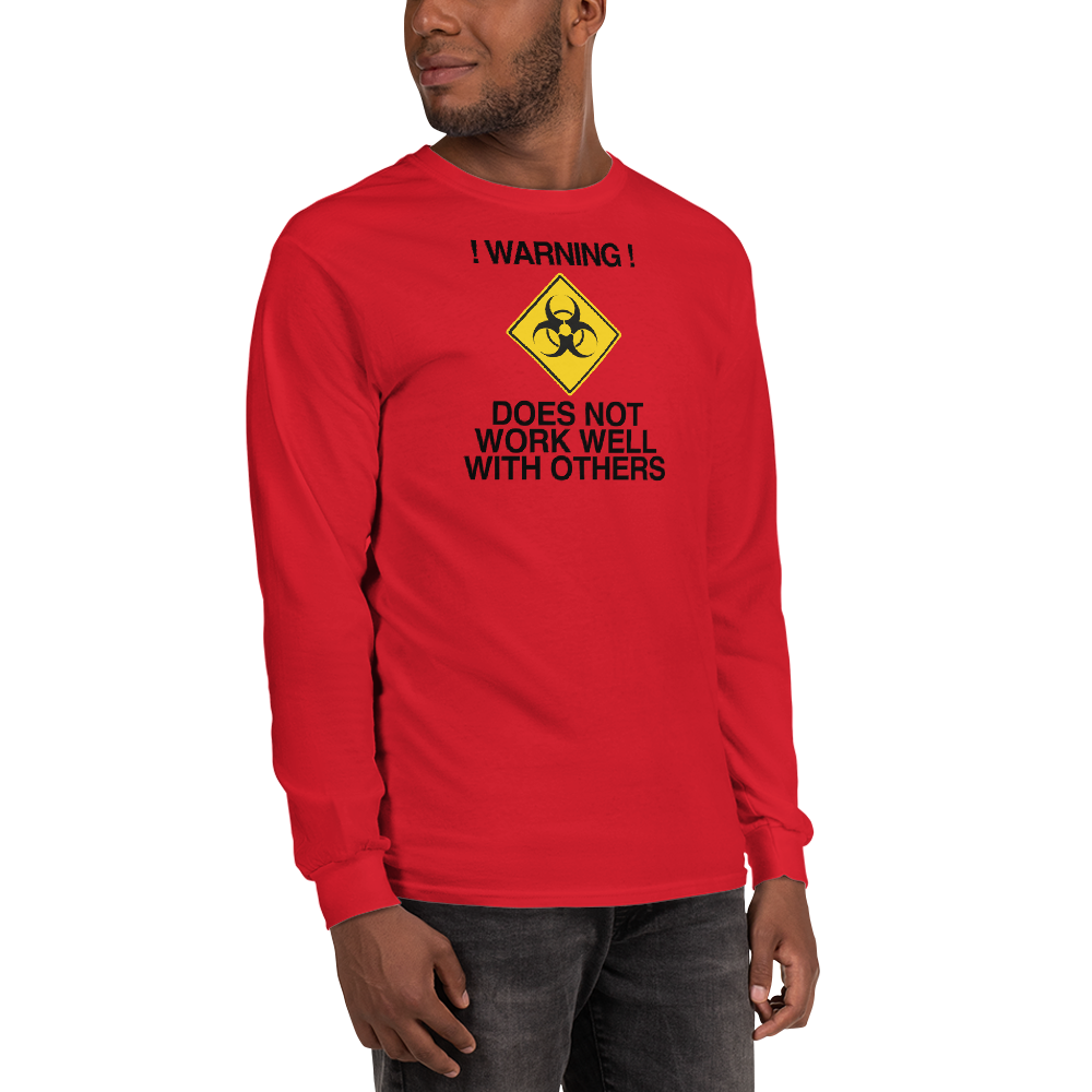 "!Warning! Does Not Work Well With Others" printed on a red men's long sleeve shirt worn by a male