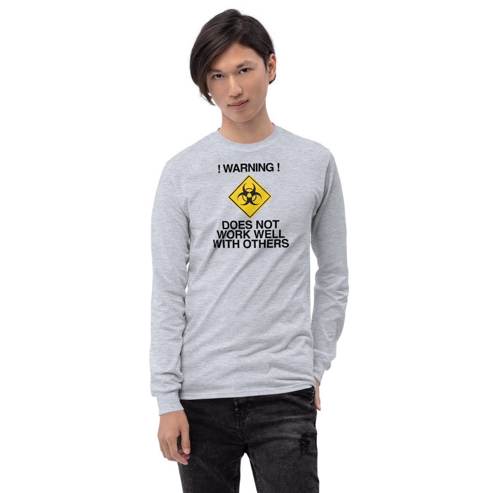 "!Warning! Does Not Work Well With Others" printed on a sport grey men's long sleeve shirt worn by a male