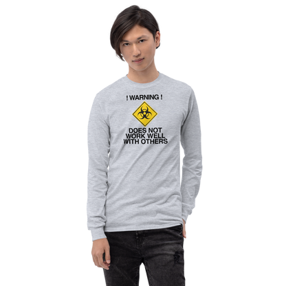 "!Warning! Does Not Work Well With Others" printed on a sport grey men's long sleeve shirt worn by a male