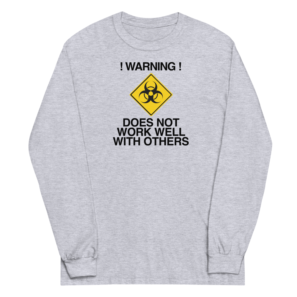 "!Warning! Does Not Work Well With Others" printed on a sport grey men's long sleeve shirt laying on a flat surface