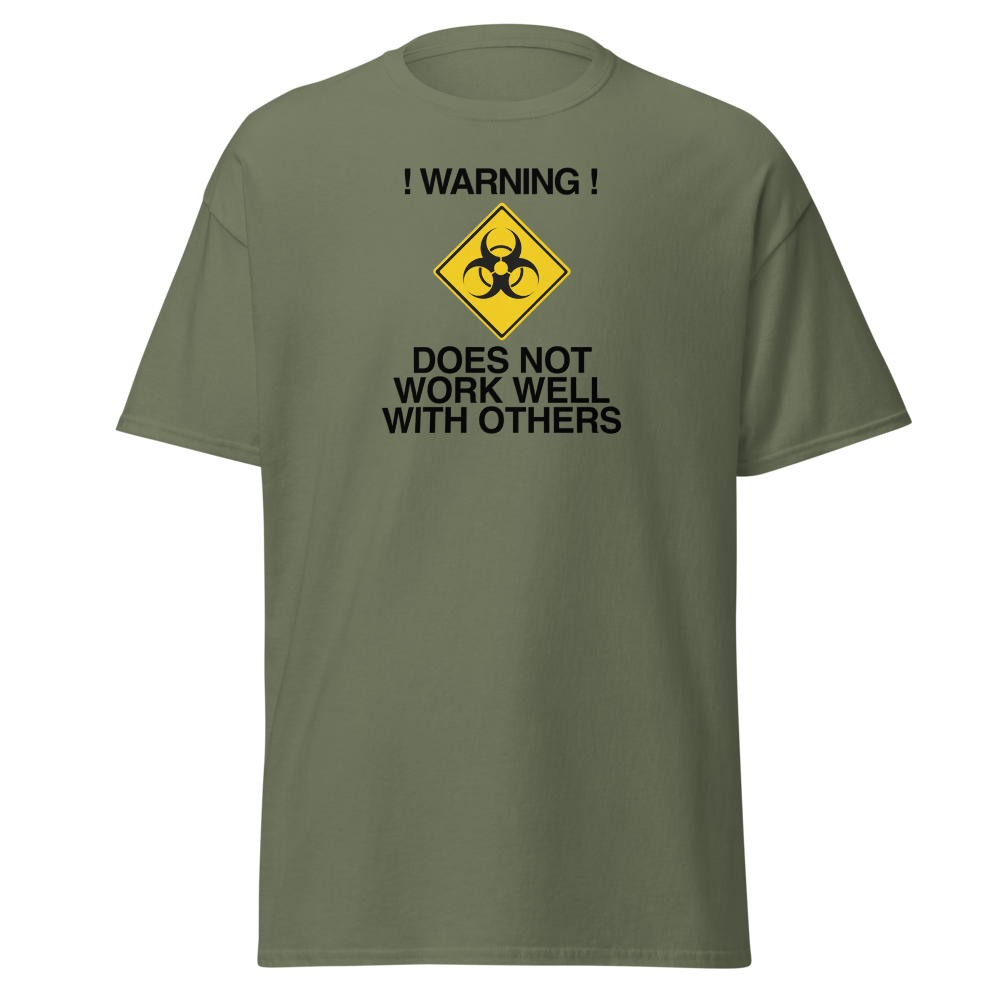 "!Warning! Does Not Work Well With Others" printed on a military green on an invisible body