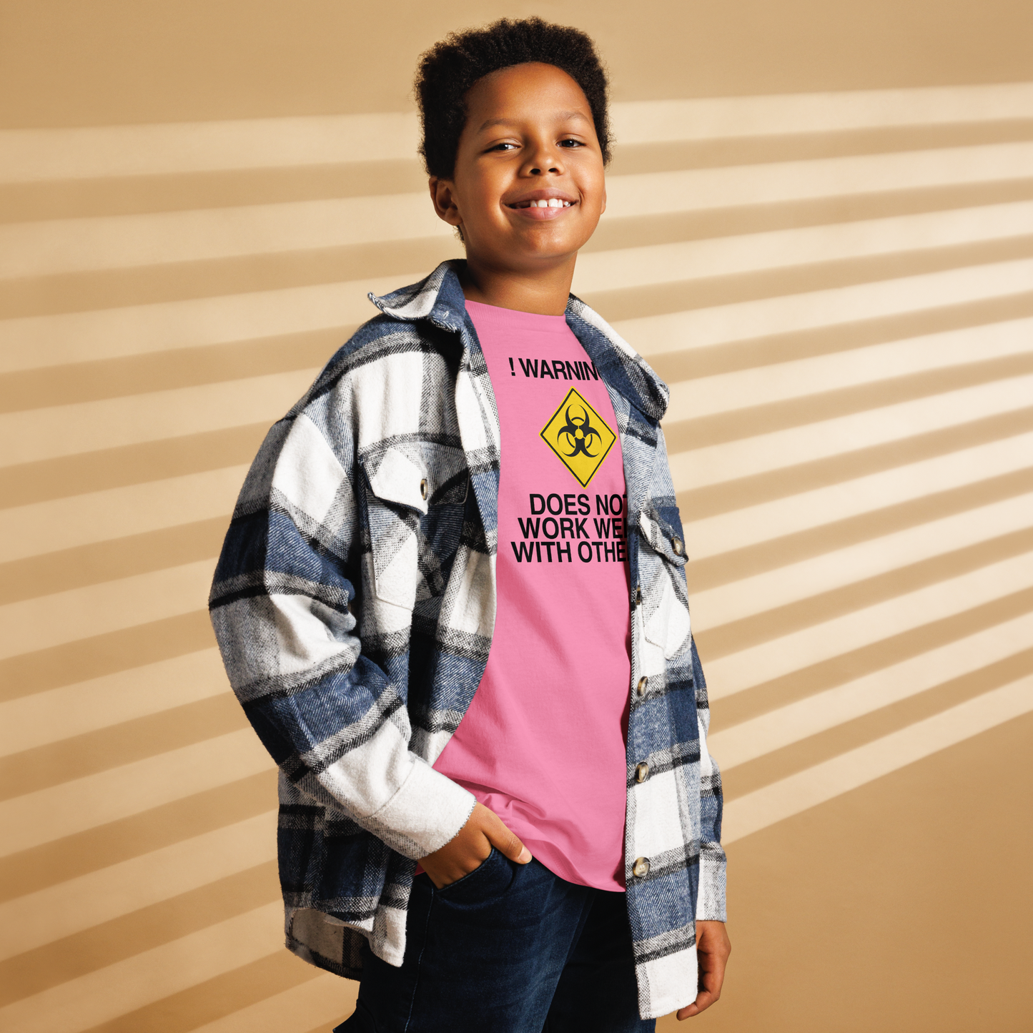 "!Warning! Does Not Work Well With Others" printed on a azalea youth classic tee worn by a male also wearing a jacket