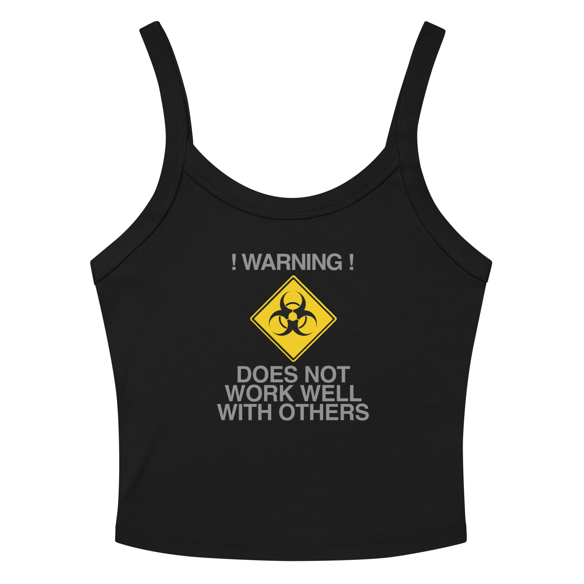"!Warning! Does Not Work Well With Others" printed on a solid black blend women's micro-rib tanktop laying on a flat surface amongst sunglasses and shorts