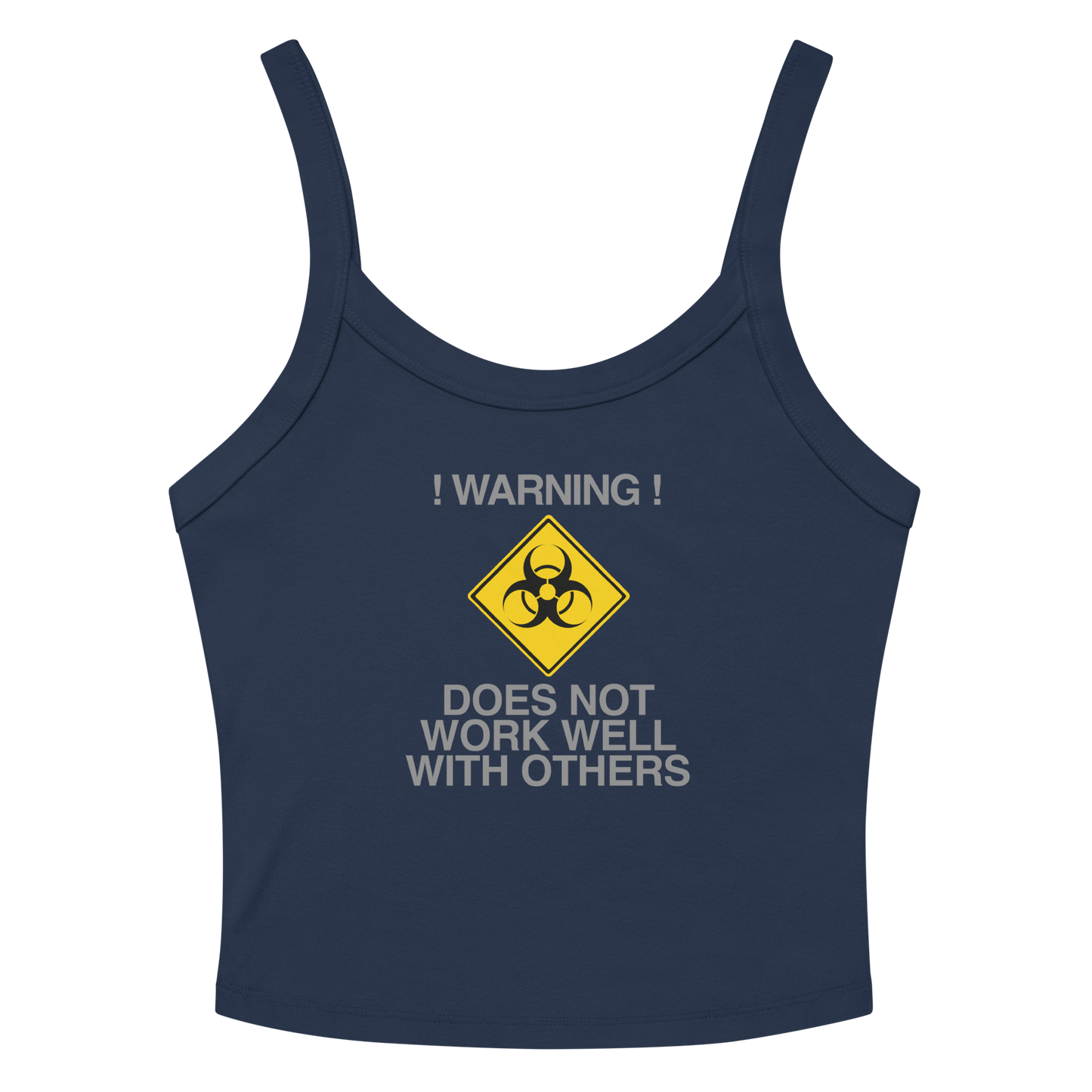 "!Warning! Does Not Work Well With Others" printed on a solid navy blend women's micro-rib tanktop laying on a flat surface amongst sunglasses and shorts