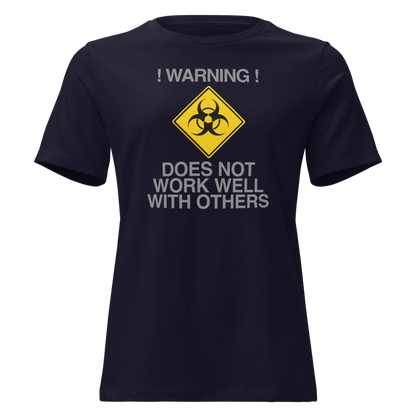 "!Warning! Does Not Work Well With Others" printed on a navy on an invisible / simulated body