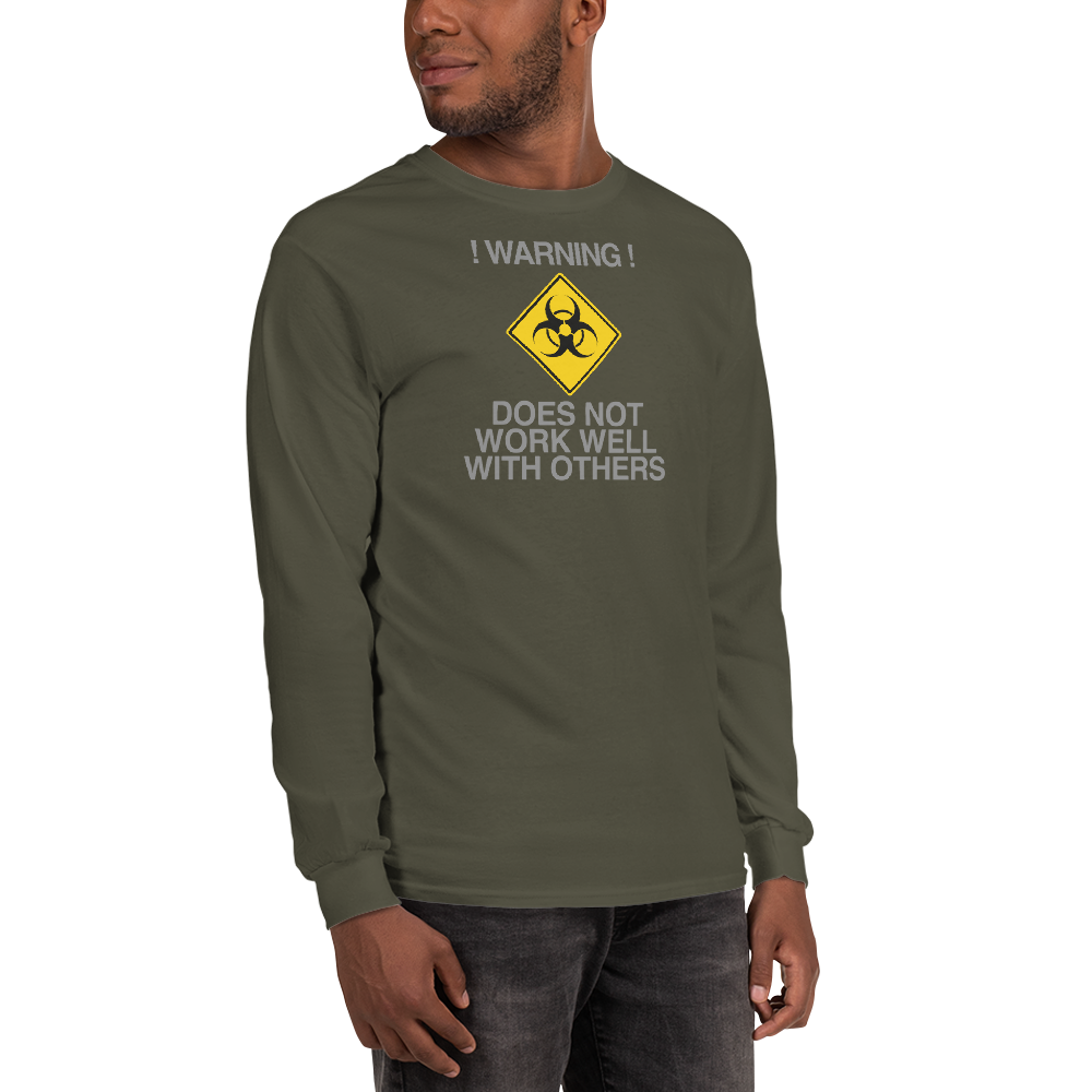"!Warning! Does Not Work Well With Others" printed on a military green men's long sleeve shirt worn by a male