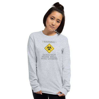 "!Warning! Does Not Work Well With Others" printed on a sport grey men's long sleeve shirt worn by a female