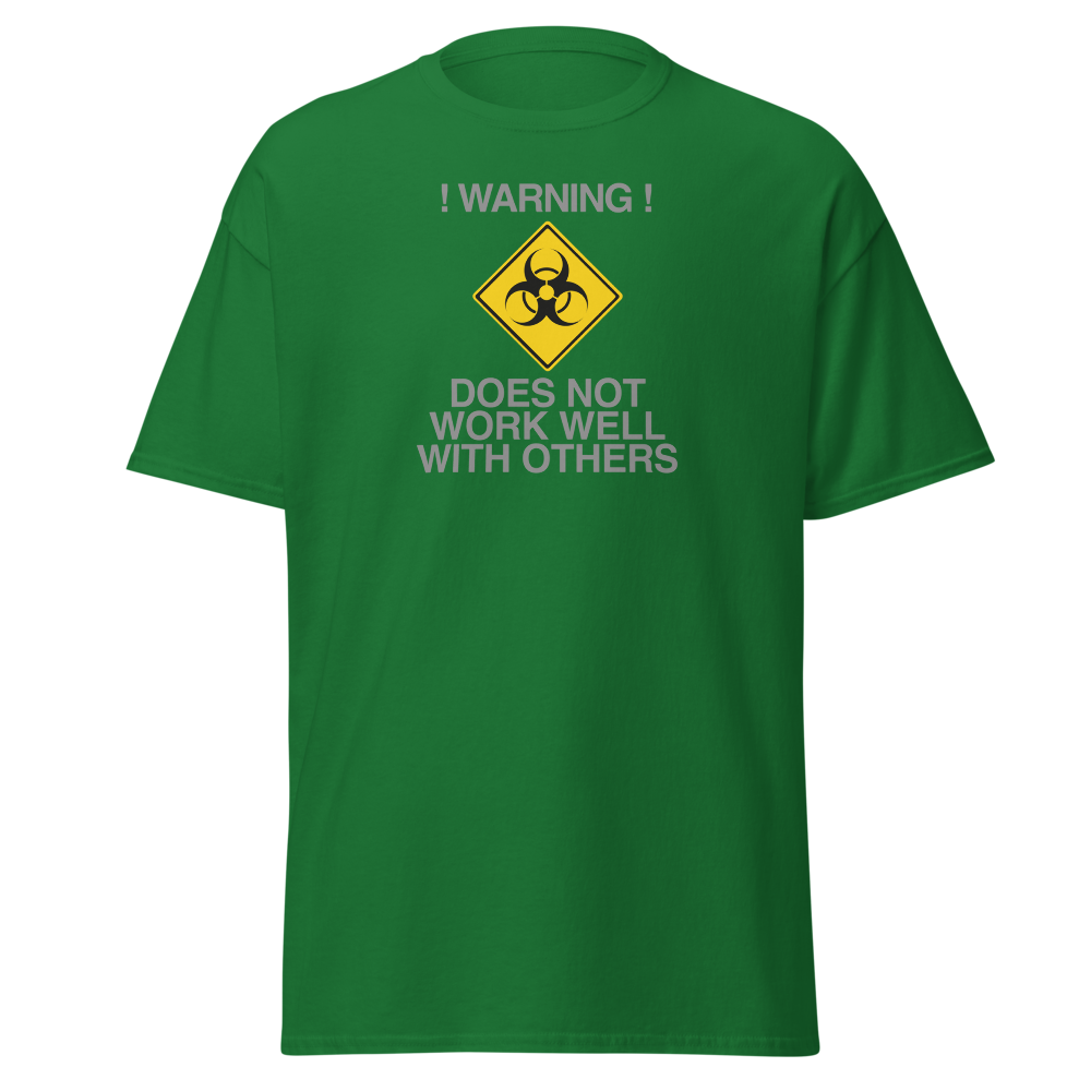 "!Warning! Does Not Work Well With Others" printed on a turf green on an invisible body