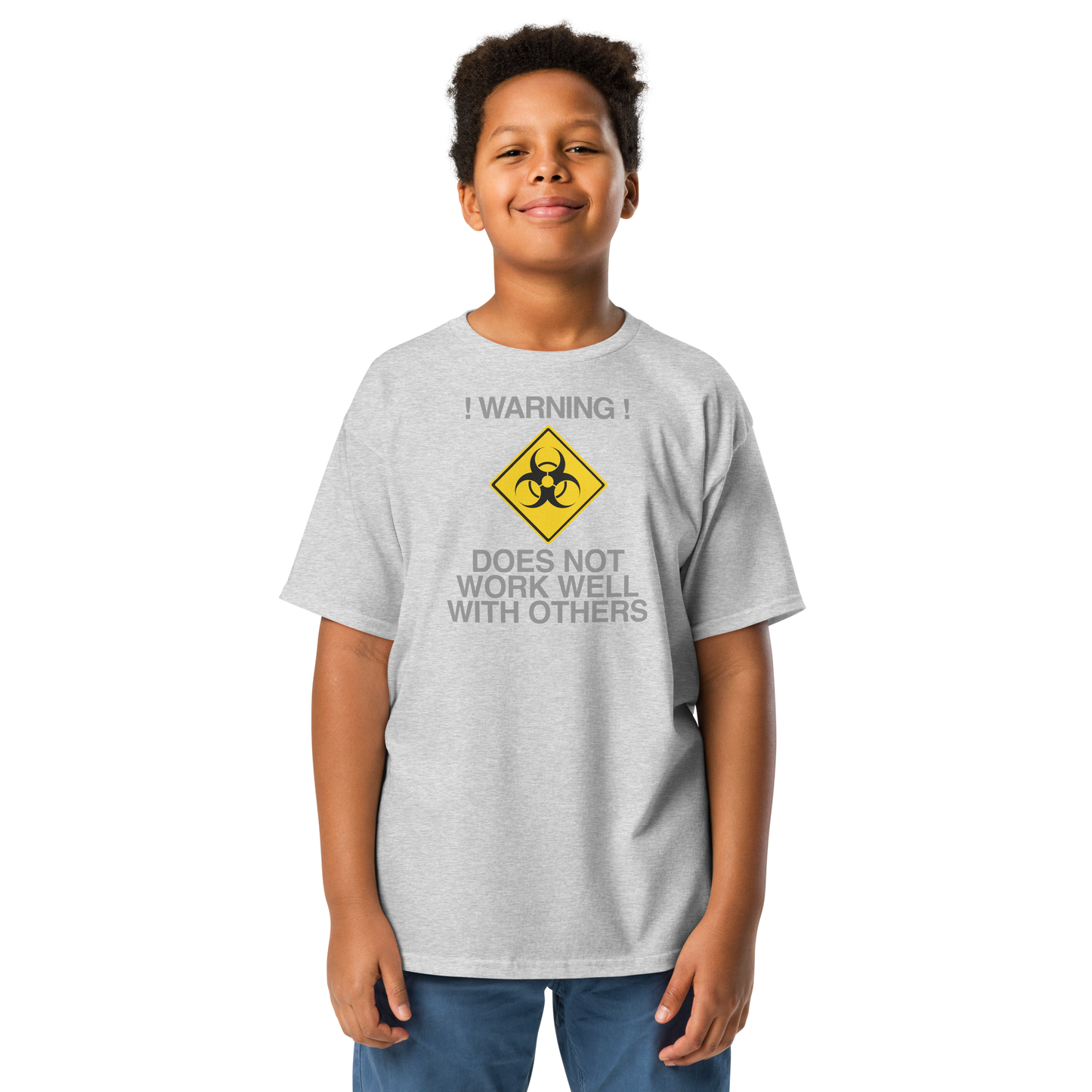 "!Warning! Does Not Work Well With Others" printed on a sport grey youth classic tee worn by a male