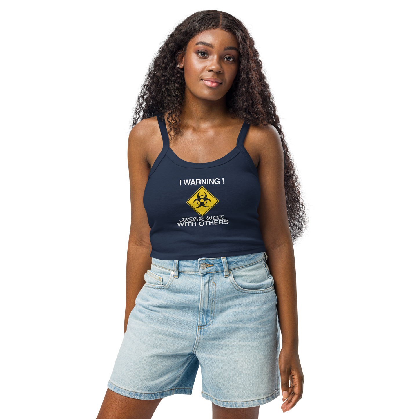 "!Warning! Does Not Work Well With Others" printed on a solid navy blend women's micro-rib tanktop worn by a female