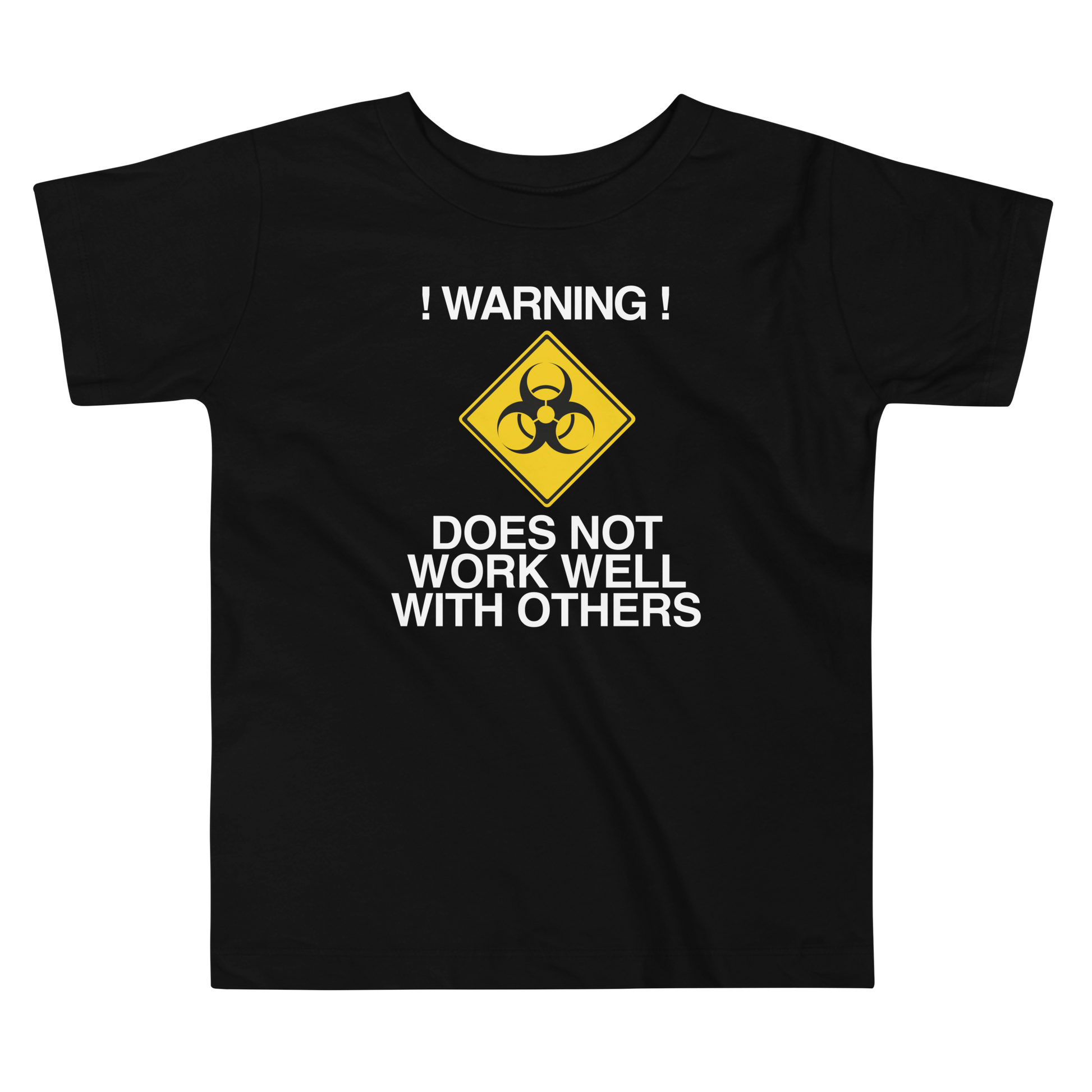 "!Warning! Does Not Work Well With Others" printed on a black toddler short sleeve tee laying on a flat surface