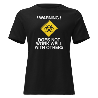 "!Warning! Does Not Work Well With Others" printed on a black on an invisible / simulated body