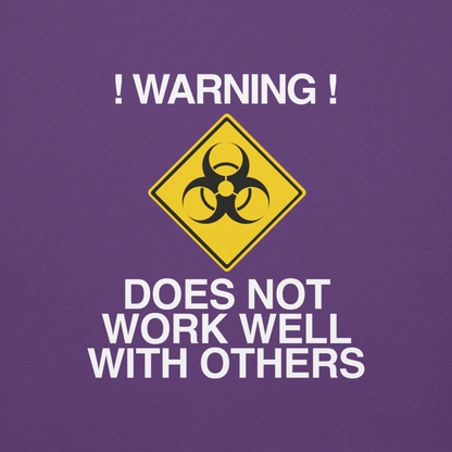 "!Warning! Does Not Work Well With Others" printed on a purple background