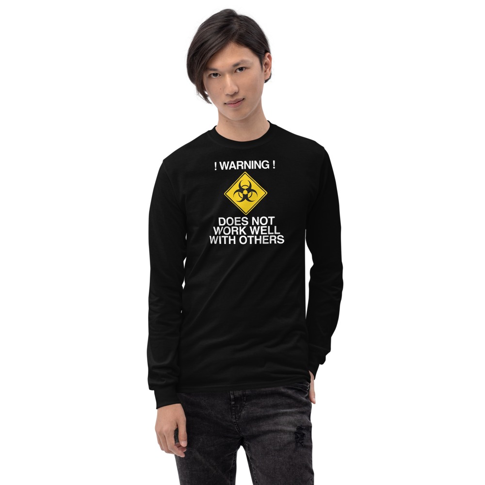 "!Warning! Does Not Work Well With Others" printed on a black men's long sleeve shirt worn by a male
