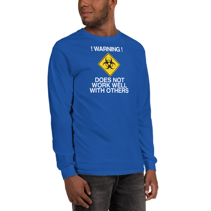 "!Warning! Does Not Work Well With Others" printed on a royal men's long sleeve shirt worn by a male
