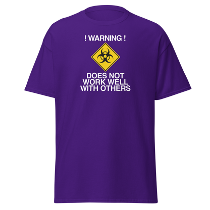 "!Warning! Does Not Work Well With Others" printed on a purple on an invisible body