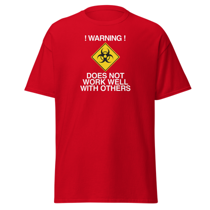 "!Warning! Does Not Work Well With Others" printed on a red on an invisible body