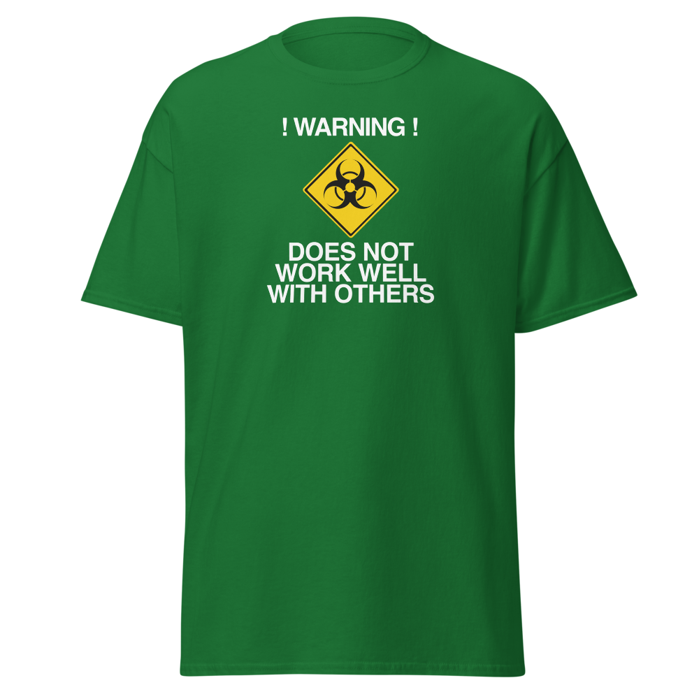 "!Warning! Does Not Work Well With Others" printed on a turf green on an invisible body