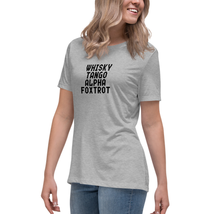 "Whisky Tango Alpha Foxtrot" printed on a athletic heather women's relaxed t-shirt worn by a female