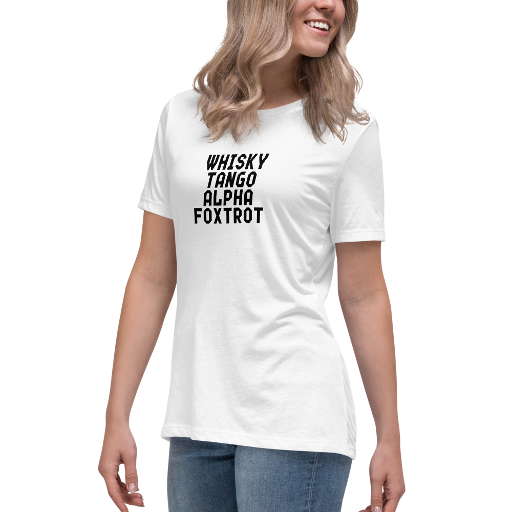 "Whisky Tango Alpha Foxtrot" printed on a white women's relaxed t-shirt worn by a female