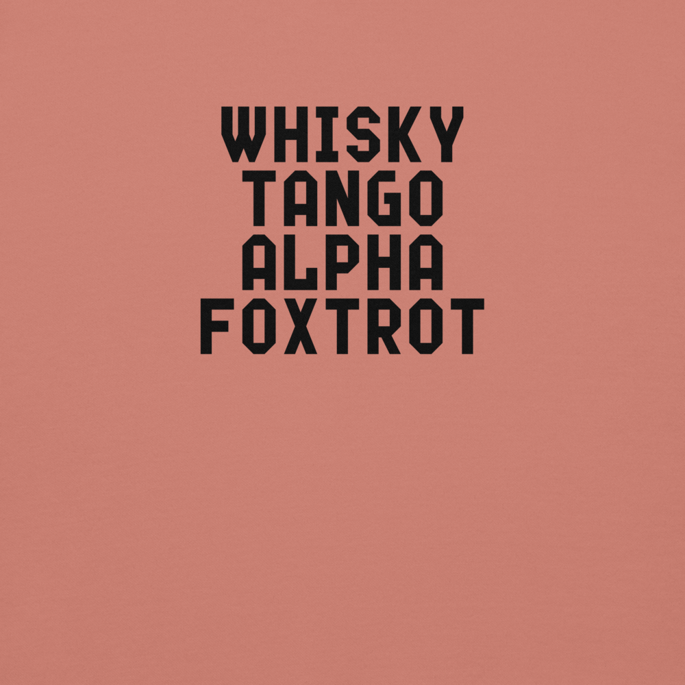 "Whisky Tango Alpha Foxtrot" printed on a dusty rose background