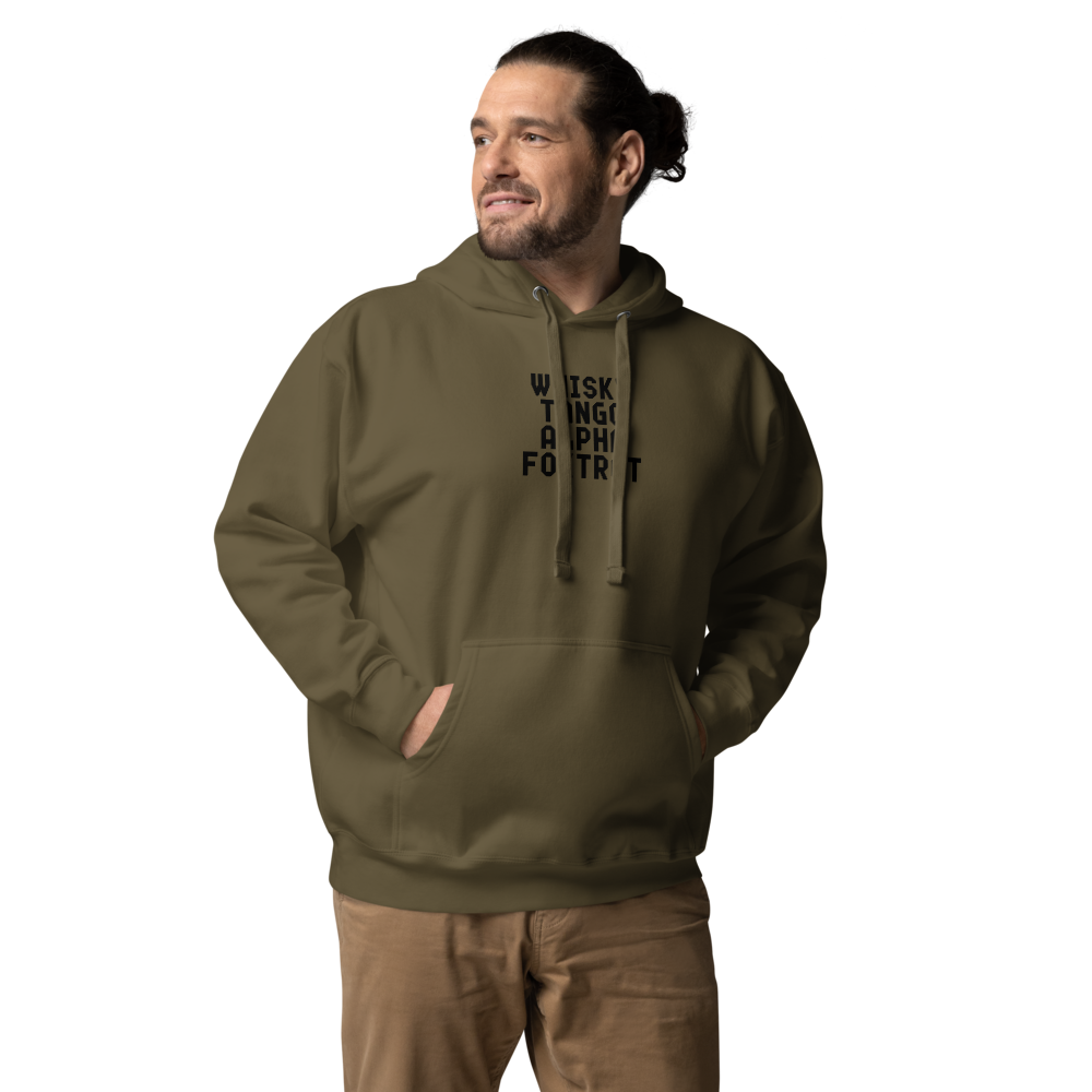 "Whisky Tango Alpha Foxtrot" printed on a military green unisex hoodie worn by a male