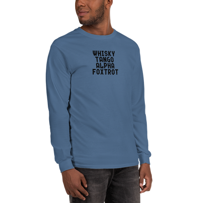 "Whisky Tango Alpha Foxtrot" printed on a indigo blue men's long sleeve shirt worn by a male