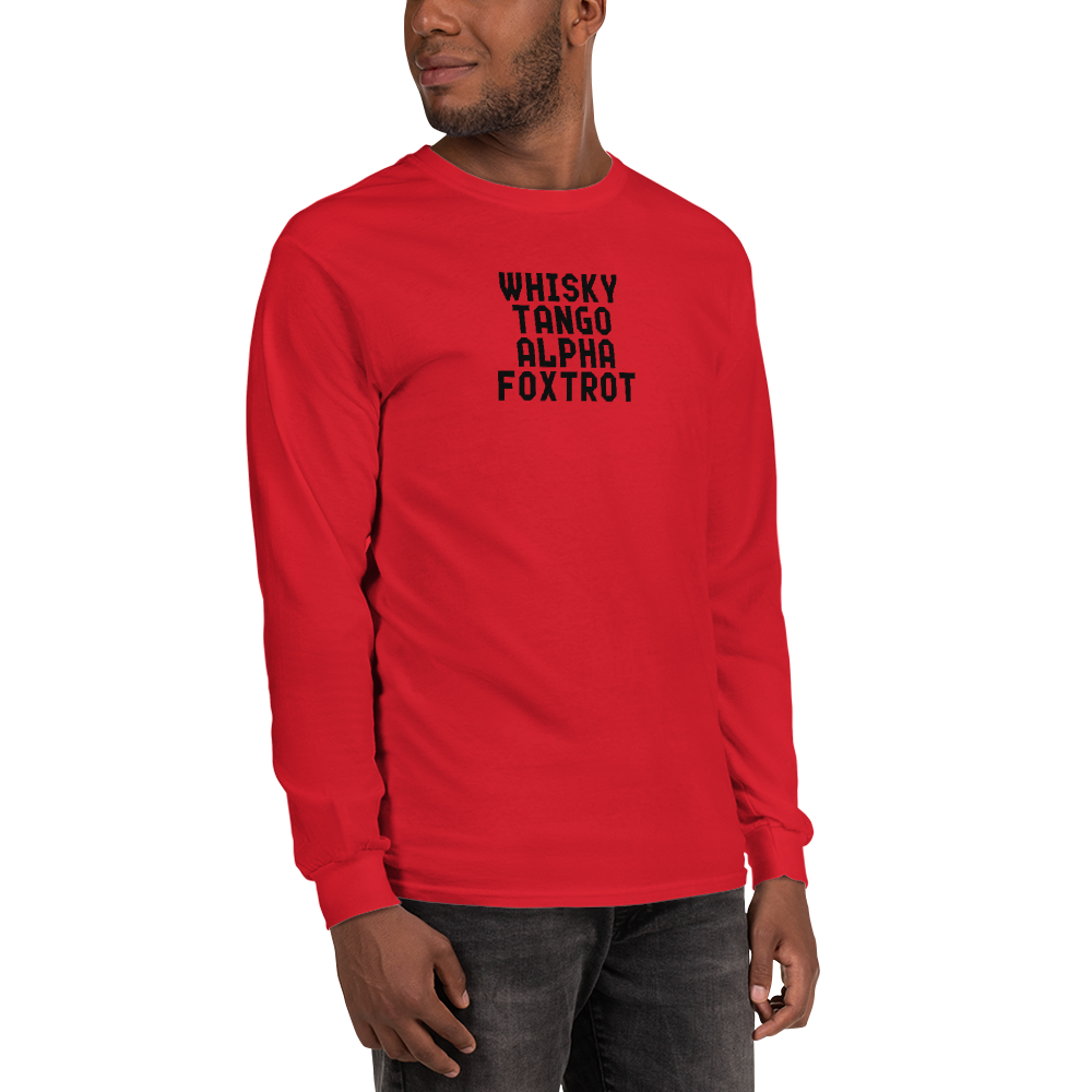 "Whisky Tango Alpha Foxtrot" printed on a red men's long sleeve shirt worn by a male