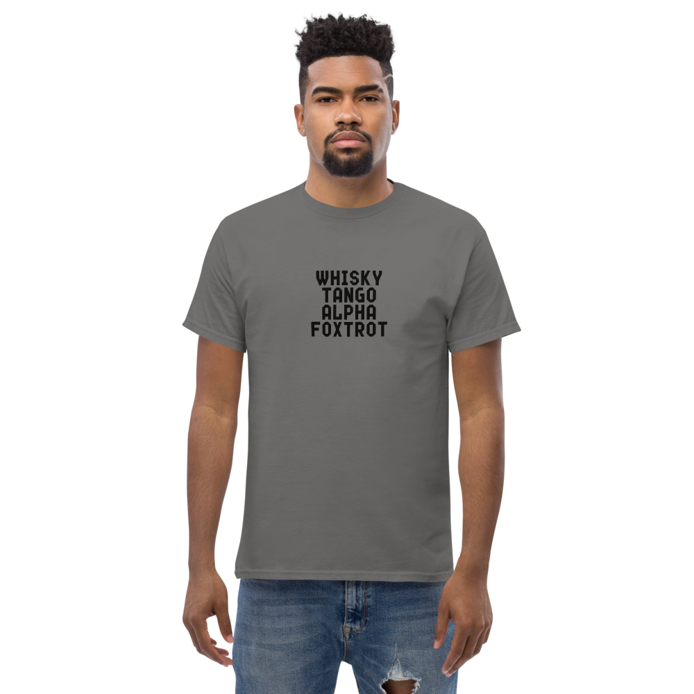 "Whisky Tango Alpha Foxtrot" printed on a charcoal unisex classic tee worn by a male