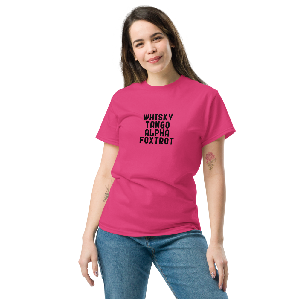 "Whisky Tango Alpha Foxtrot" printed on a heliconia unisex classic tee worn by a female
