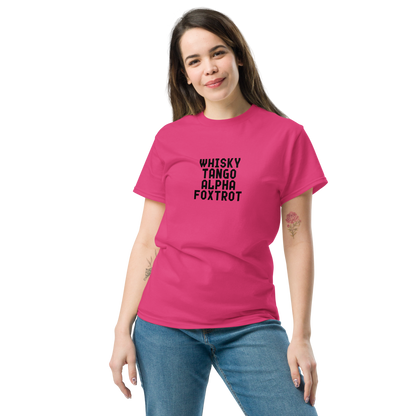 "Whisky Tango Alpha Foxtrot" printed on a heliconia unisex classic tee worn by a female