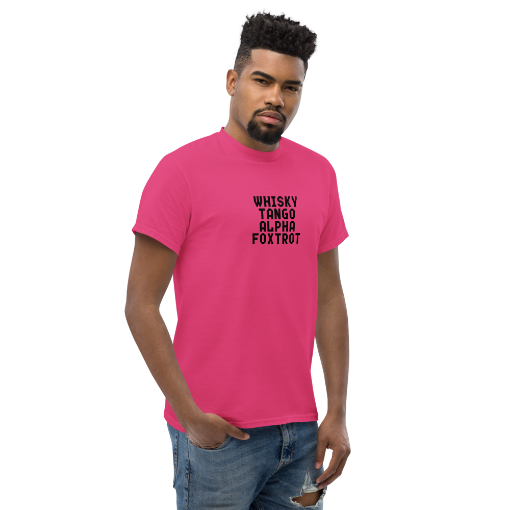 "Whisky Tango Alpha Foxtrot" printed on a heliconia unisex classic tee worn by a male