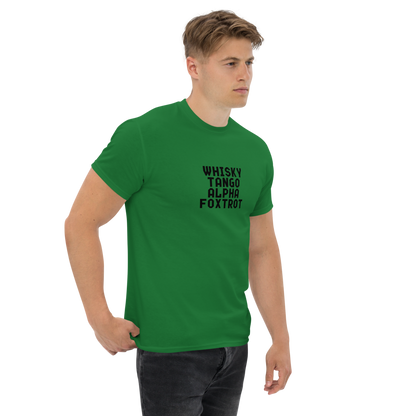 "Whisky Tango Alpha Foxtrot" printed on a turf green unisex classic tee worn by a male