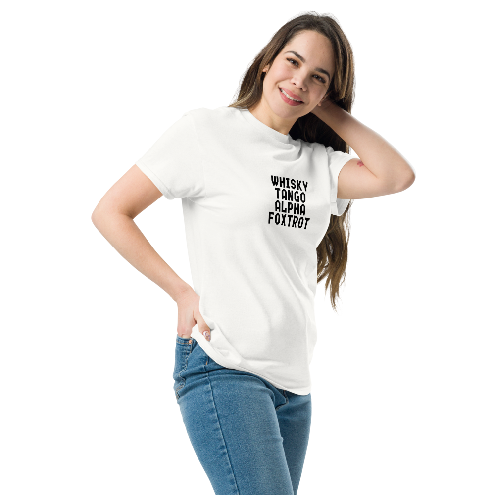 "Whisky Tango Alpha Foxtrot" printed on a white unisex classic tee worn by a female