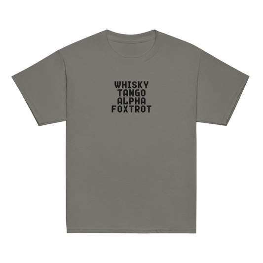 "Whisky Tango Alpha Foxtrot" printed on a charcoal youth classic tee laying on a flat surface