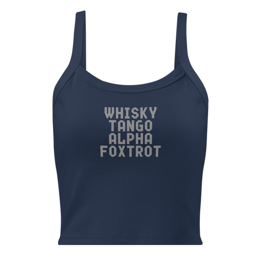 "Whisky Tango Alpha Foxtrot" printed on a solid navy blend women's micro-rib tanktop laying on a flat surface