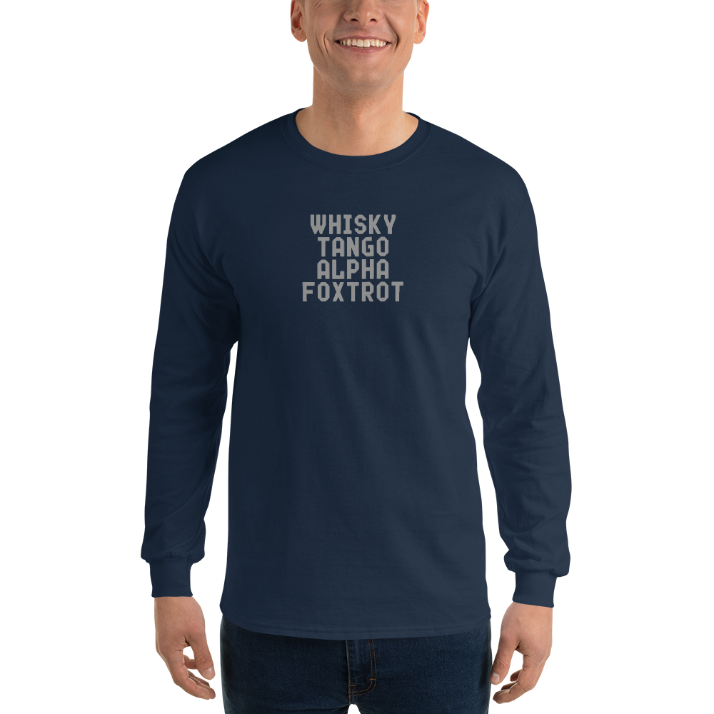 "Whisky Tango Alpha Foxtrot" printed on a navy men's long sleeve shirt worn by a male