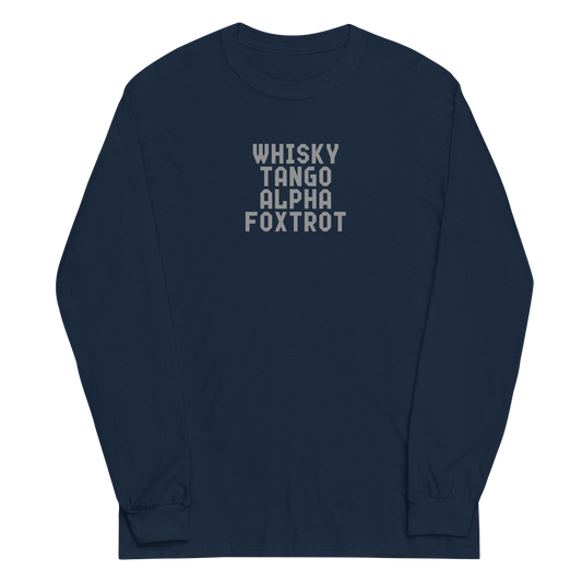 "Whisky Tango Alpha Foxtrot" printed on a navy men's long sleeve shirt laying on a flat surface