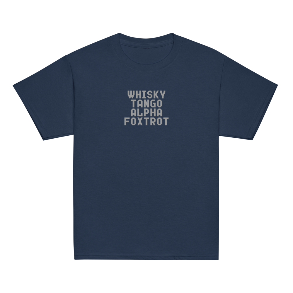 "Whisky Tango Alpha Foxtrot" printed on a navy youth classic tee laying on a flat surface