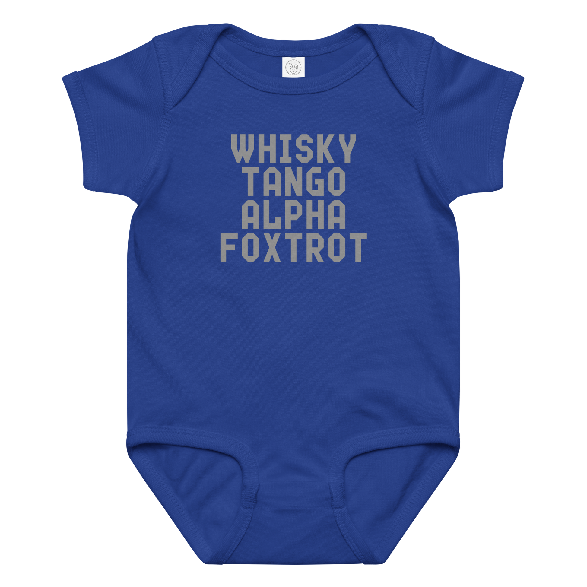"Whisky Tango Alpha Foxtrot" printed on a royal baby jersey bodysuit laying on a flat surface amongst other clothes