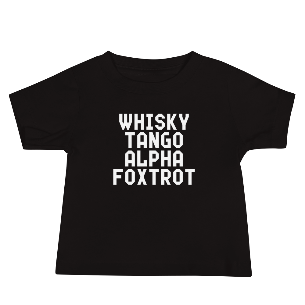 "Whisky Tango Alpha Foxtrot" printed on a black baby jersey short sleeve tee laying on a flat surface